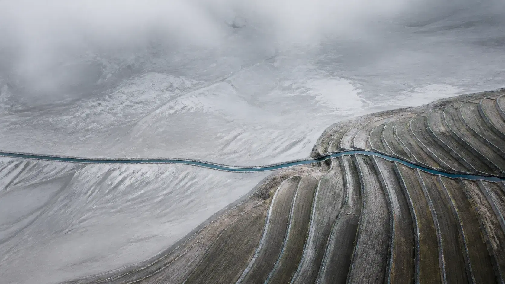 An aerial landscape divided into measured bands, representing a clear baseline across changing AI answers